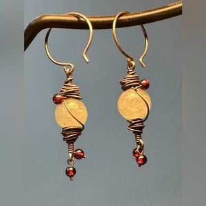 Pale Green Bead Earrings with Silver Wire and purple accent beads.